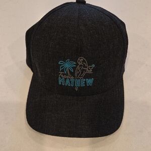 Travis Mathew Black Hat with Blue Embroidery